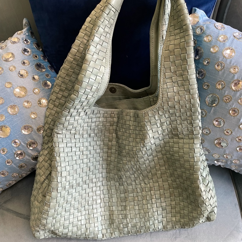 Light Blue Basket weave supple  leather  tote bag with zipper and snap closure.